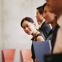 Young Businesswoman Standing Out